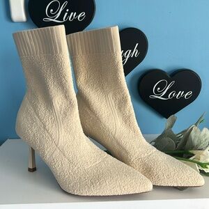 Dream pairs brand cream colored slip on booties size 8.